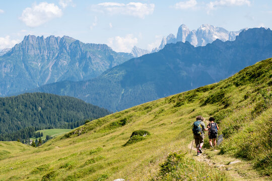 hikers on the paths of the San Pellegrino pass