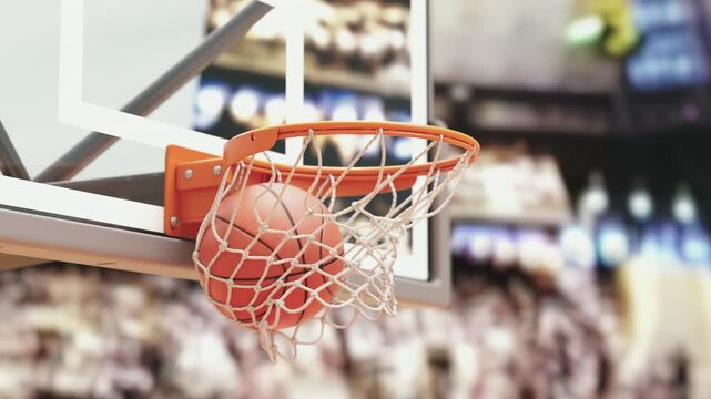 Basketball ball going through hoop net on a basketball arena. Slow motion 3d video animation