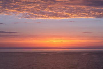 Beautiful sunrise on the seashore. Sunrise on the Black Sea coast. Kurortne resort. Ukraine.