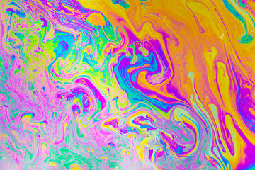 Psychedelic multicolored background abstract. Rainbow colors. patterns background. Photo macro shot of soap bubbles