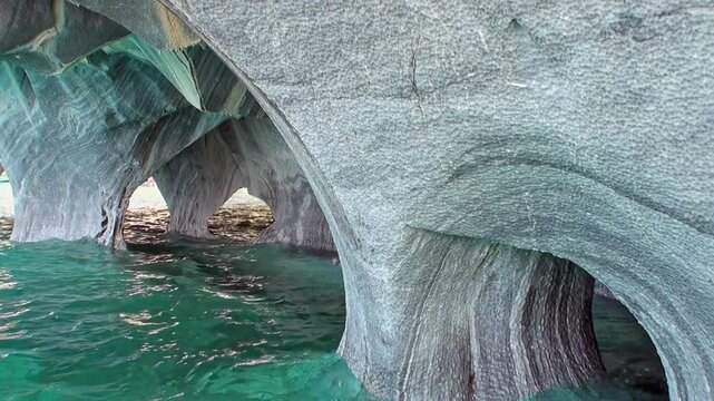Exploring Stunning Marble Caves Of Chile Under Crystal Clear Water Discover breathtaking of Marble Caves in Chile with their unique formations and vibrant turquoise waters glowing beneath rocky arches