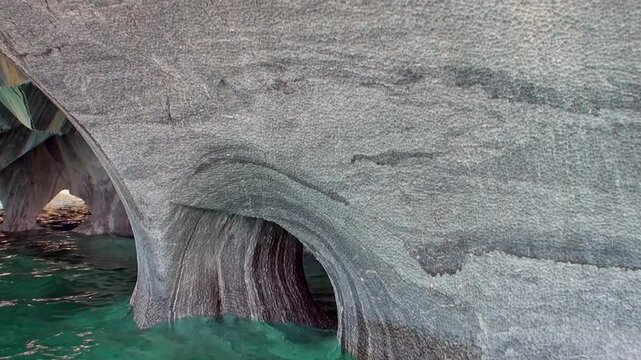 Majestic Granite Formations Beneath Crystal Blue Waters at Marble Caves Explore the stunning granite formations and vibrant waters of Marble Caves, revealing nature's artistry at its finest.