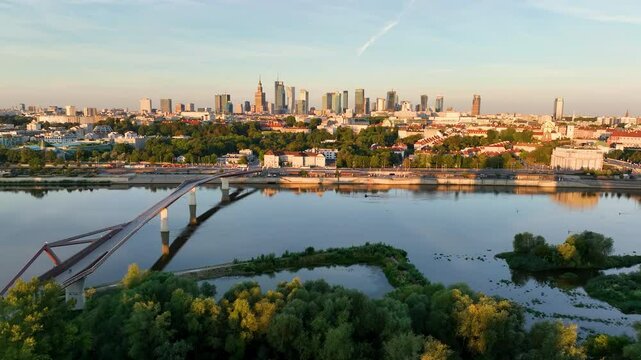 Aerial view of the Warszawa cityscape. Old town and modern skyscrapers at sunrise, Royal Castle. Poland.