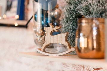 Christmas composition with beautiful decoration, Christmas tree, wooden deer and other accessories