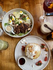 Breakfast pancakes and caesar salad 