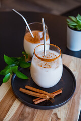 Horchata with cinnamon and coffee in a glass in Coffee Shop