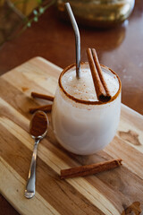 Horchata with cinnamon and coffee in a glass in Coffee Shop