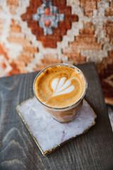 Coffee, Cortado, Latte with Latte art in Cozy Coffee Shop with Plants and Flowers