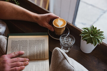 Coffee, Cortado, Latte with Latte art in Cozy Coffee Shop with Plants and Flowers