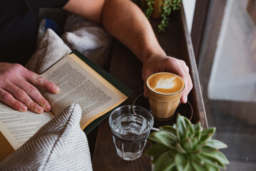 Coffee, Cortado, Latte with Latte art in Cozy Coffee Shop with Plants and Flowers