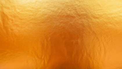 gold or orange foil texture background abstract gradient bright and shiny light reflection rough texture surface glass effect background