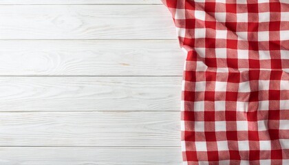 Fototapeta premium red checkered picnic tablecloth on white wood table