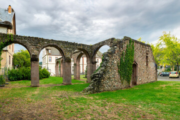 The remains of the cloister in the ruins of the 17th century Abbey of Saint Gregory in the village...