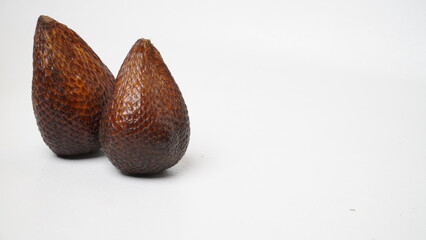 Fresh ripe salak fruit or snakefruit isolated on white background