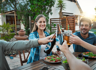Lunch, alcohol and people in garden for toast, celebration and connection for bonding together. Outdoor, smile and friends with beer bottle in social gathering, cheers or salad as food for nutrition