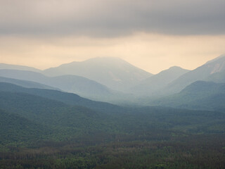 Obraz premium Adirondack Mountains layered in haze viewed from the summit of Mt. Van Hoevenberg, outside Lake Placid, New York State.