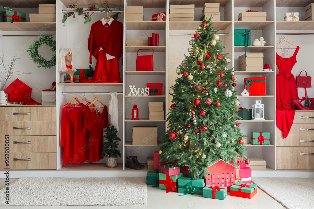 Sticker Modern wardrobe with stylish festive clothes, gift boxes and Christmas tree