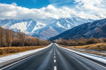 Fototapeta premium Straight asphalt highway road and snow mountains with sky clouds natural landscape. car background , ai