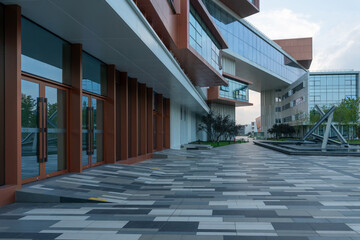 empty concrete ground in front of modern office buildings in downtown. floor for copy space