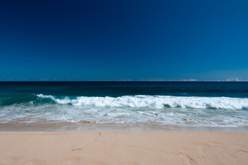 Waves on a beach in Poipu Kauai Hawaii during the Day