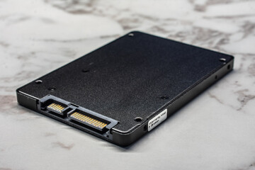 High-Speed SATA SSD Solid State Drive with Top-View Close-Up on White Background
