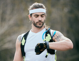 Fitness, man and check smart watch outdoor for health progress, exercise results or heartbeat....