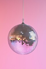 Fototapeta premium Silver disco ball isolated on pink background 