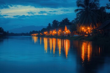 Obraz premium Peaceful riverside town during Loi Krathong in Lao