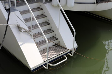 a berth for mooring yachts and boats in a seaport.