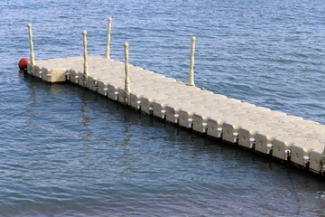 a berth for mooring yachts and boats in a seaport.