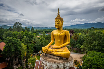 Obraz premium The Buddha statue at Wat Thavorn Chaisiri, Chaiyaphum, Thailand