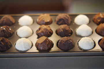 A Selection of Assorted Gourmet Chocolate Truffles Beautifully Arranged on Display