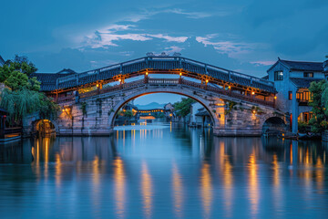 Chinese ancient town at night, ancient stone bridges and residential buildings