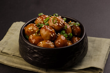 Meatballs Teriyaki with Sesame Seeds in a Bowl.