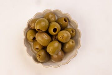Pickled Pitted Green Olives or Zaitun in a Bowl.
