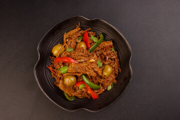 Ropa Vieja is Cuban Style Shredded Beef, Braised Beef in Cuban Style Sauce.