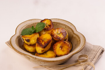 Platanos Maduros or Fried Sweet Plantain is a Side Dish in Latin and Caribbean Snack.