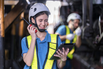 Engineer checking construction process railway and checking work on railroad station . Railway...