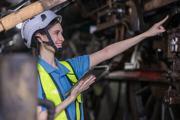Engineer checking construction process railway and checking work on railroad station . Railway...