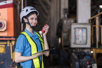 Engineer checking construction process railway and checking work on railroad station . Railway engineer checking machines in train station. Train engineer concept