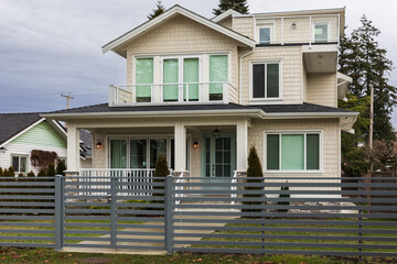 New Modern House Apartment Buildings in Vancouver BC. Canadian modern residential architecture on sunny summer day