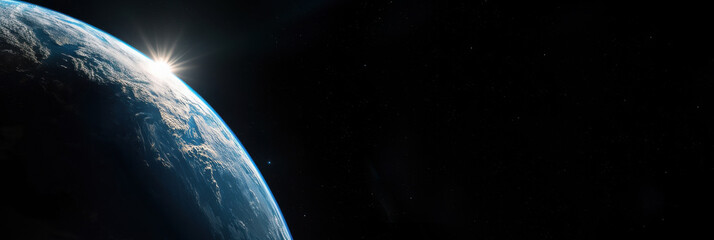 Earth viewed from space with sunlight illuminating clouds and a glimpse of the atmosphere against the black backdrop of the cosmos