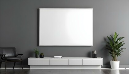 A large white framed canvas or projection screen mounted on a gray wall above a modern gray cabinet or entertainment.
