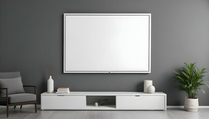 A large white framed canvas or projection screen mounted on a gray wall above a modern gray cabinet or entertainment.