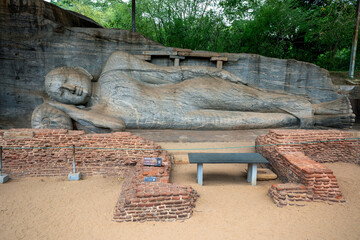 The reclining Buddha statue of Gal Vihara at the ancient site of Polonnaruwa in Sri Lanka. It is carved out of a single slab of granite rock.