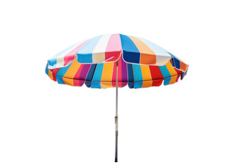 A colorful beach umbrella with vibrant stripes set up on a sandy beach with a clear blue sky in the background