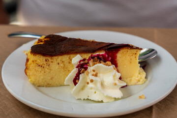 Portion of pudding caramel on plate for dessert Spain
