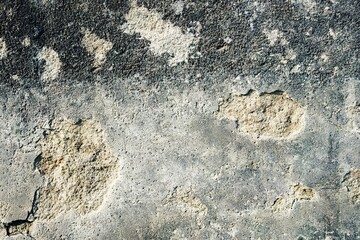 Weathered concrete wall with textured details