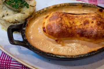 quenelle traditional fish dumpling served in crayfish sauce originating from Lyon, France
