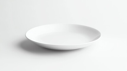 Empty white ceramic plate isolated on white background.